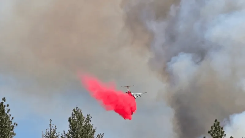 Air tankers battle 50-acre Hidden Forest Fire near Arnold Ice Cave