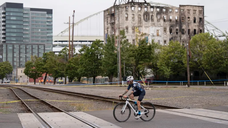 Trains expected to pass Centennial Mills warehouse as early as Monday afternoon, despite risks