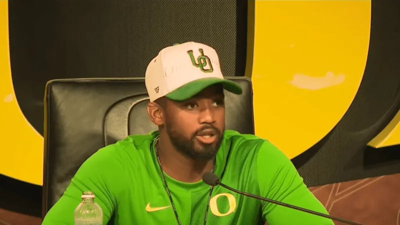 Oregon assistant coach Ra'shaad Samples speaks to media following April DUII crash