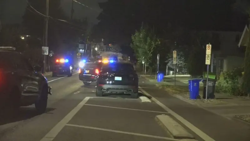 Police use loudspeaker, guns drawn outside SE Portland home after shooting report