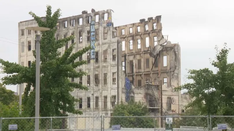 Centennial Mills demolition moves forward as crews begin pulling down walls