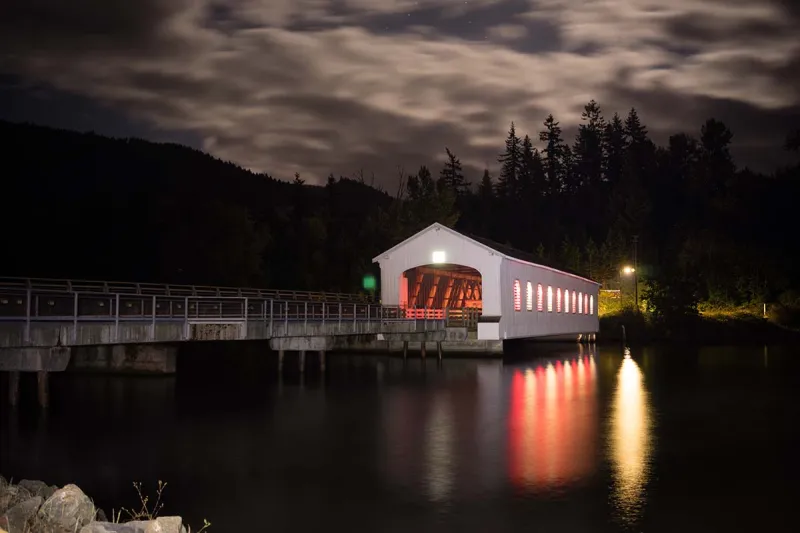 Built in 1945, Oregon's Widest Covered Bridge Has Been Hit by Trucks, Raised Six Feet, and Somehow Survived