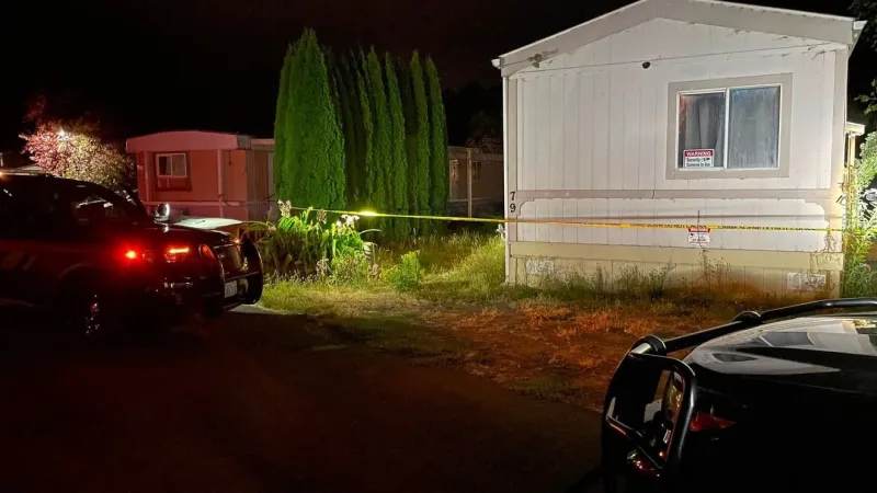 Man found dead from gunshot wounds in home with children in Longview; suspect arrested