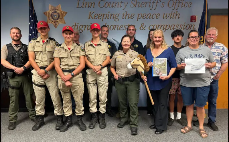 American Man organizers donate $850 to Linn County SAR
