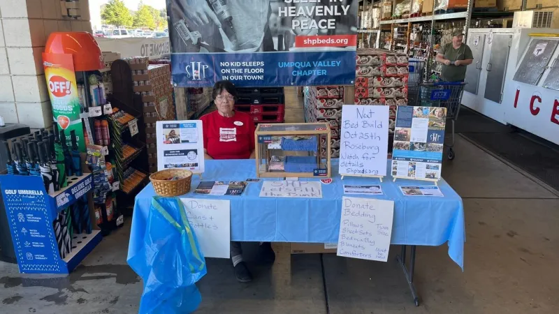 Local volunteers collecting unused bedding, donations go towards children without beds