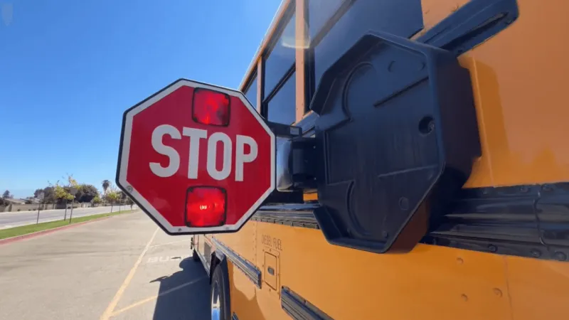 Authorities remind drivers to stop for school buses with flashing red lights