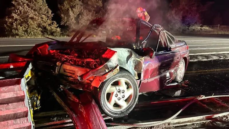 18-year-old driver escapes as car hits barrier, catches fire on Highway 97, sheriff says