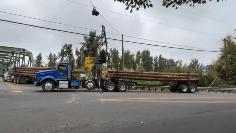 Damaged log truck trailer incident near Jasper Bridge cleared