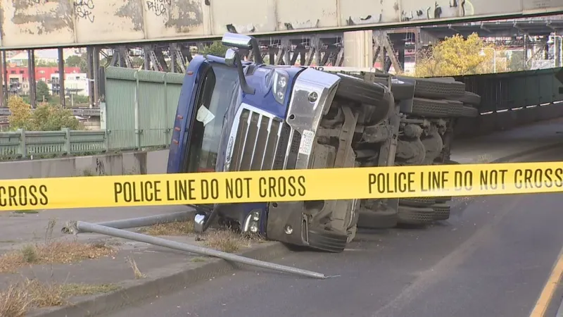 Semi truck crashes, rolls on Interstate 5 underpass in Portland's Lloyd District