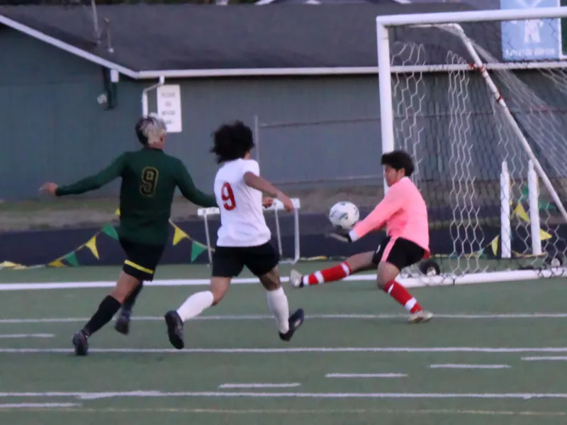 Huskies win league opener, share early lead in boys soccer