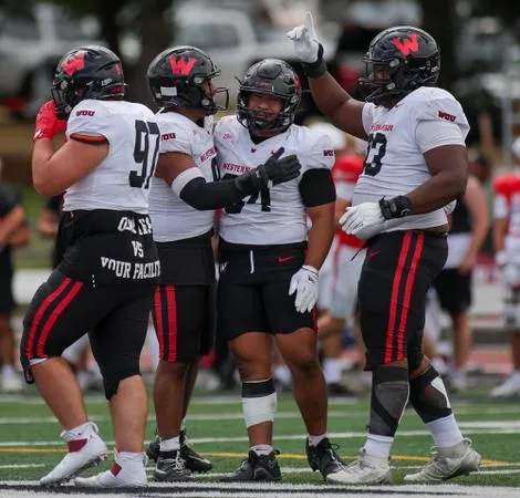 Mustangs Pull Away Late for 44-32 Win Over Wolves