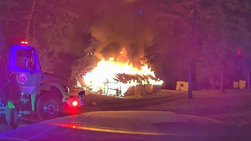 Firefighters contain early morning barn fire in Camp Creek