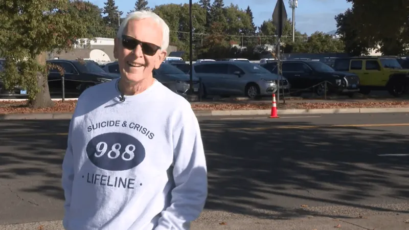 Local man hands out free 988 shirts at Ducks game to raise suicide hotline awareness