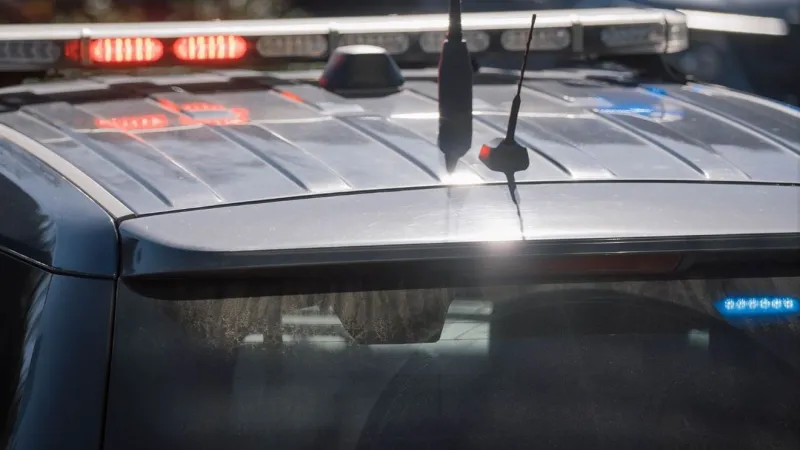 Eugene police arrest driver after truck hits light pole near railroad yard