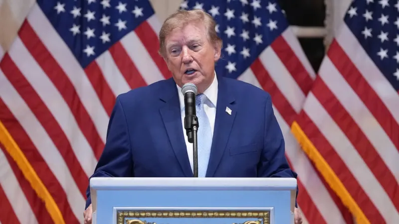 Trump puts new Russia sanctions that he recently signed into law on hold, citing national interest