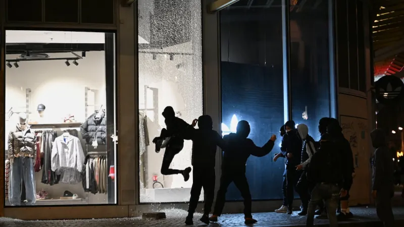 France's prime minister calls for localized curfews in cities to curb rioting and looting