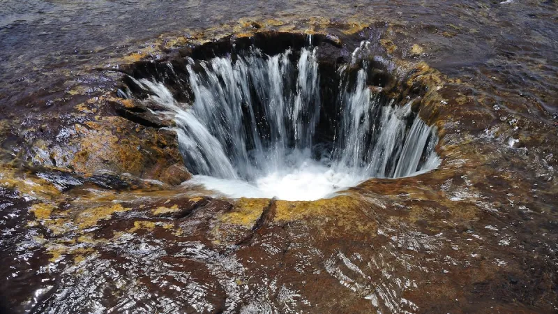 Lost Lake Disappears Down 3 Holes Into Subterranean River