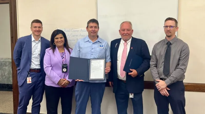 Mail carrier honored with Heroes Award