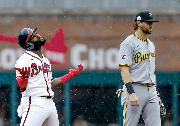 Raining on Pirates' parade: First-place Braves rally for three-game sweep of Bucs