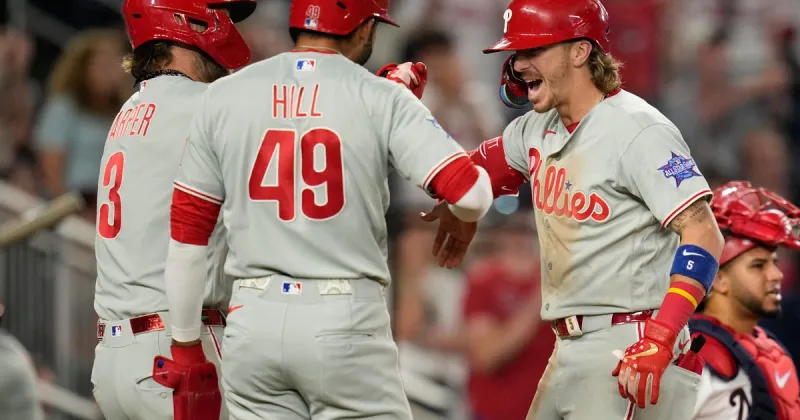 Philadelphia Phillies score 8 runs in the ninth inning and rally past Washington Nationals