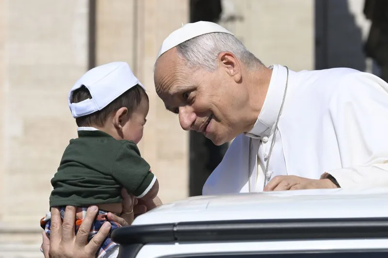 Eucharist transforms believers into Christ's body and counters division, pope says
