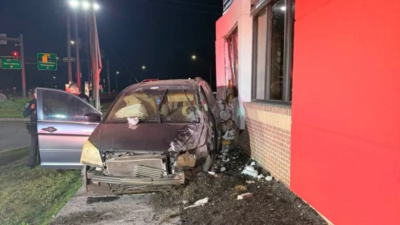 Person extricated from vehicle after crashing into Wendy's