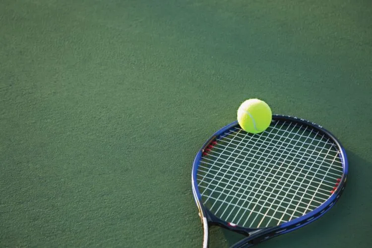 Defending Wimbledon champion opens with 5-set victory
