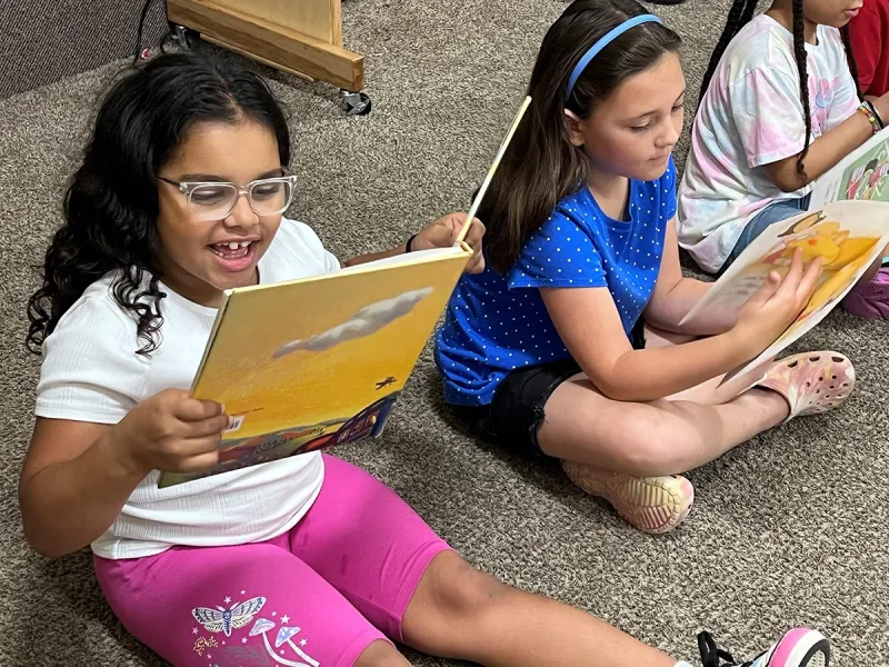 CYC helps students build a love of reading one page at a time