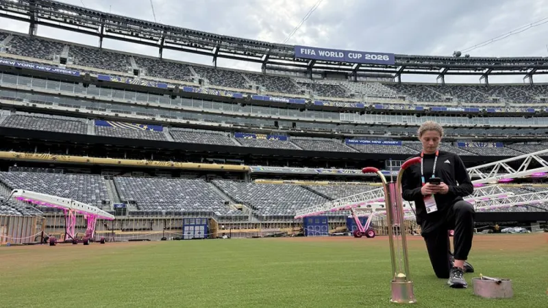 Penn State turfgrass science doctoral student interns with MetLife Stadium crew
