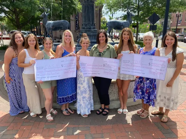 Young Mothers Study Club raises money with auction