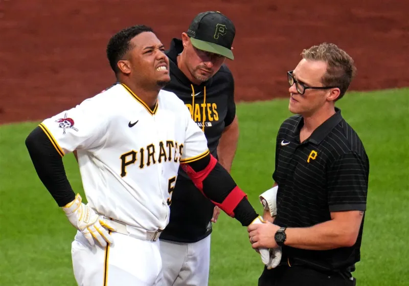 Breakout rookie Esmerlyn Valdez leaves the Pirates game after being hit by a pitch