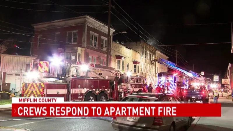 Crews battle Lewistown fire as people jump from building; injuries unknown