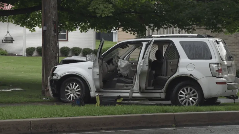 PHOTOS | 911: Three people hurt when SUV crashes into pole in Westmont Borough