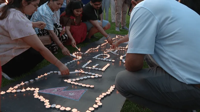 Local groups hold candlelight vigil for Nepal and China flood victims