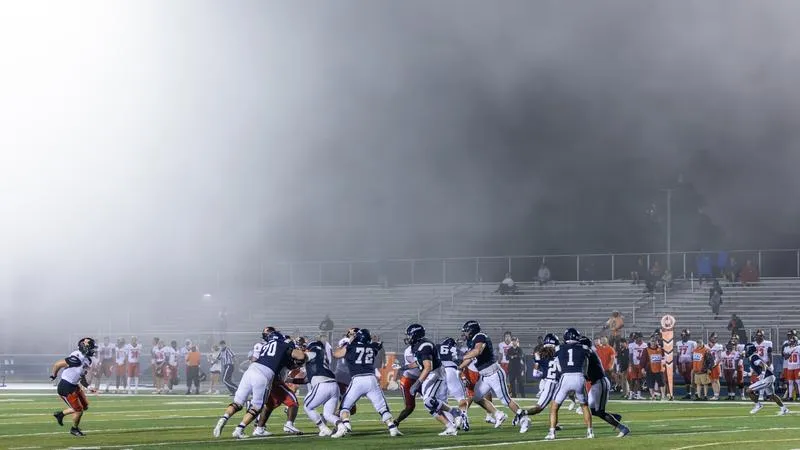 Football Routs Bobcats Despite Chaotic Weather