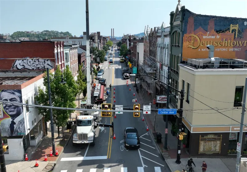 East Ohio Street is changing, even booming. Residents and business owners hope the new can lift all