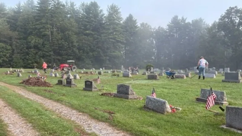PHOTOS | Volunteers help clean up storm damage at Curtin Twp. cemetery