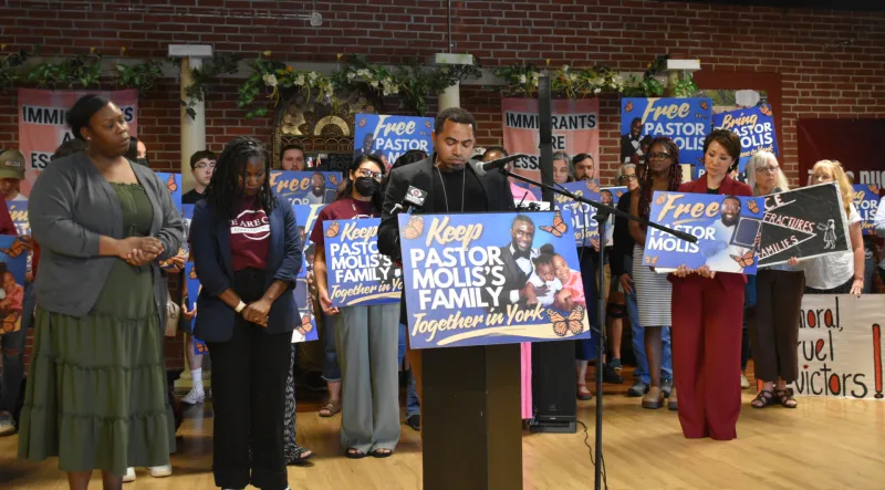 'Pulled off the plane' -- Deportation stayed for York pastor, Haitian immigrant