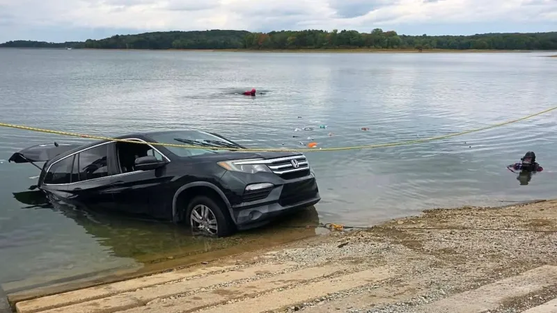 PHOTOS | Dive teams remove SUV, trailer from lake in York County