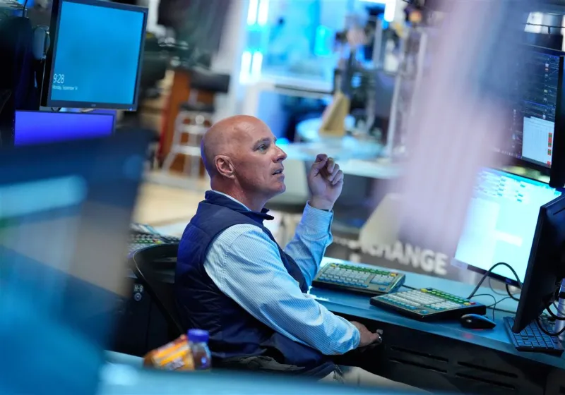 U.S. stocks slip after the bond market keeps up the pressure and oil prices rise