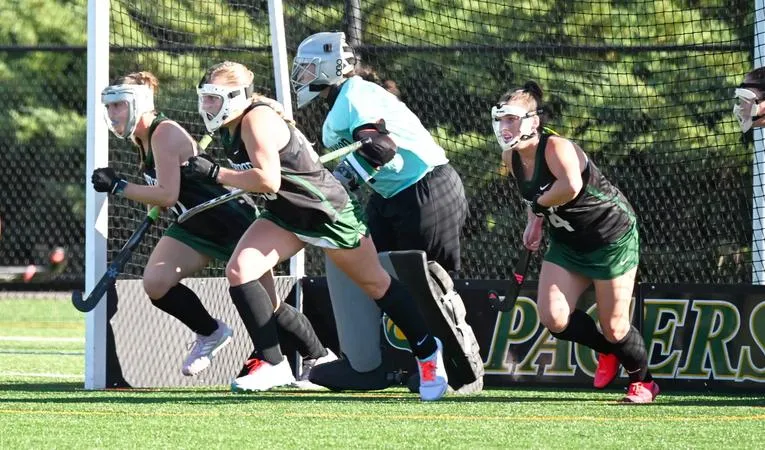 Field Hockey Dashes Lions on the Road