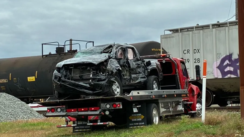 Emergency crews on scene of pick up truck hit by train in Cumberland County