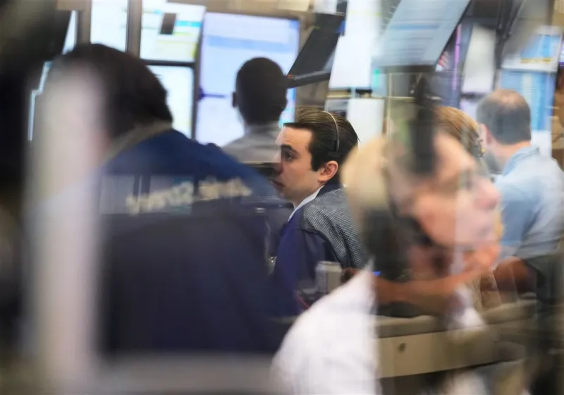 Stocks and bonds are holding relatively steady after a potentially encouraging update on inflation