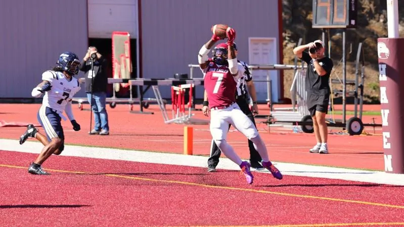 Footman's arm, Bauer's leg lift Football to thrilling Homecoming victory over Clarion