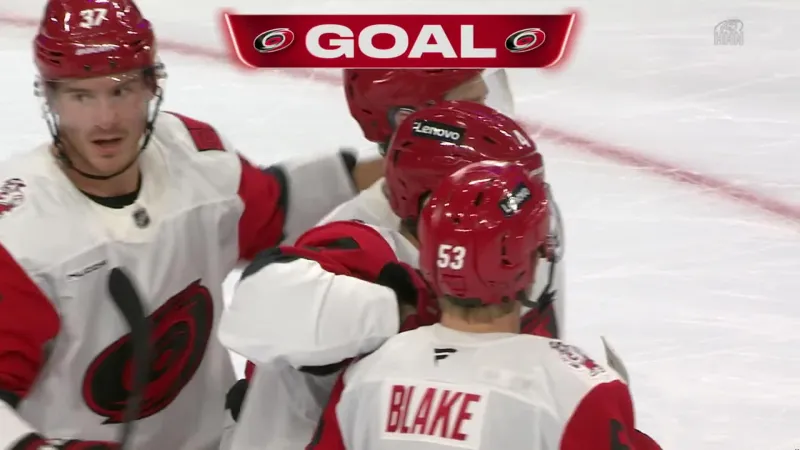 Hurricanes beat the Flyers 3-2 in OT for their first win as Aho sco...