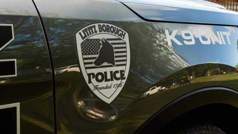Pedestrian injured after jumping on hood of car while being hit at Lititz intersection