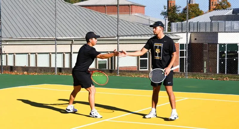 Men's tennis defeats Geneva 4-3 to remain unbeaten
