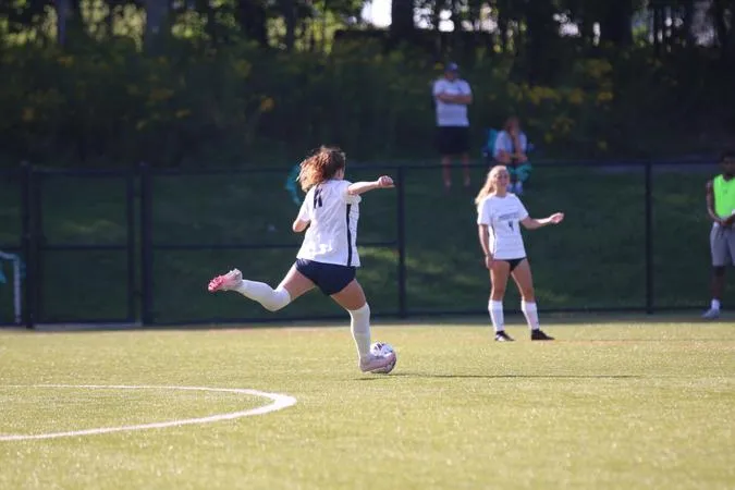 Mounties Battle Marietta Under the Lights