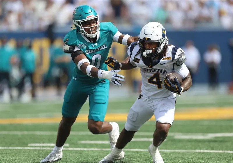 Shorthanded Arizona steamrolls West Virginia