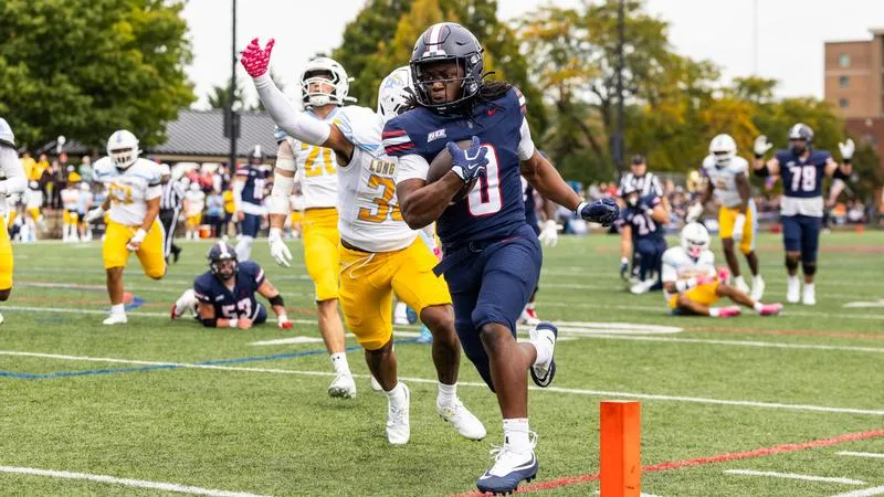 Dukes Edged by Sharks in NEC Opener